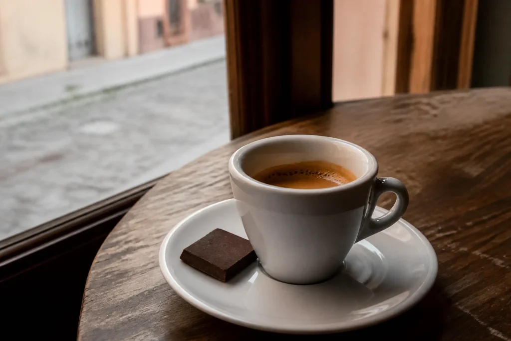 Espresso and dark chocolate at a café in Salta