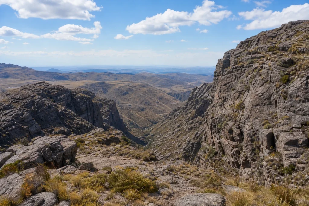 Rocky gorge and open highland terrain at Quebrada del Condorito National Park in Córdoba, Argentina.