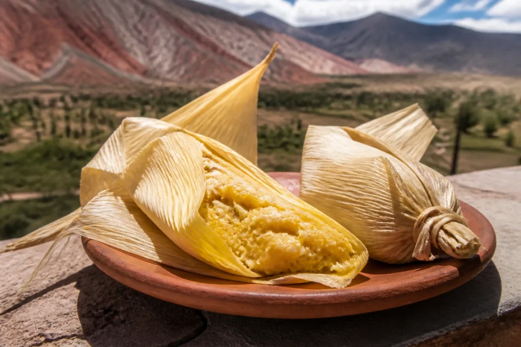 Humita en chala served in corn husks in northwestern Argentina