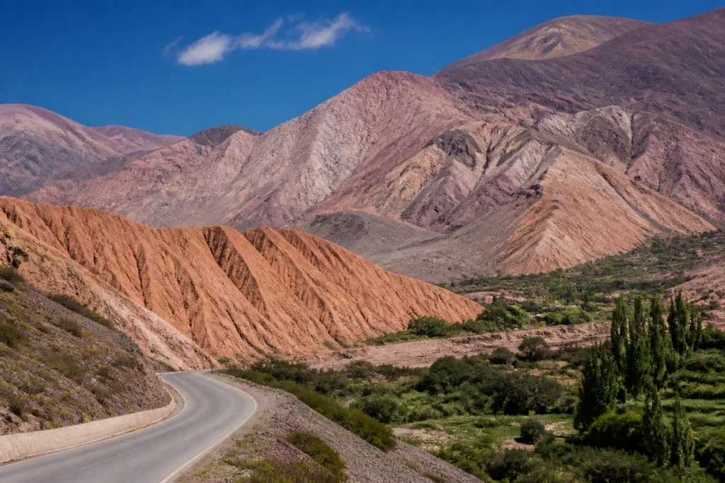 Layered mountains and a road in Argentina’s Quebrada de Humahuaca