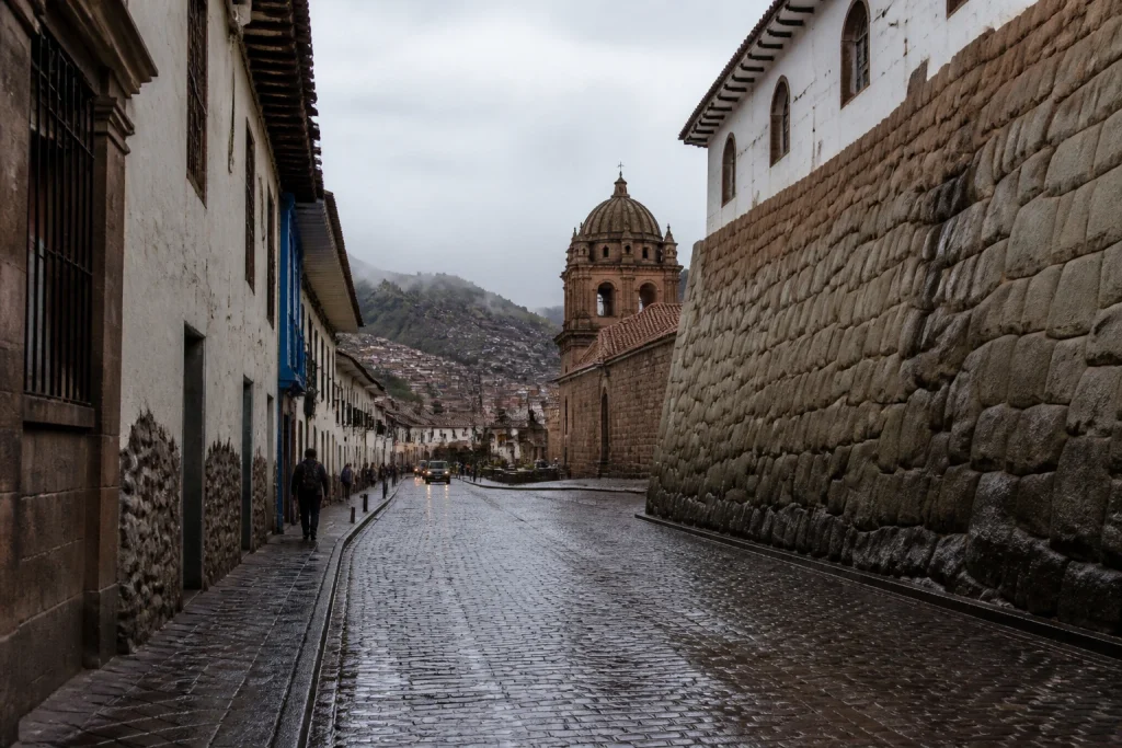 Rain-darkened street in Cusco Historic Center, Peru