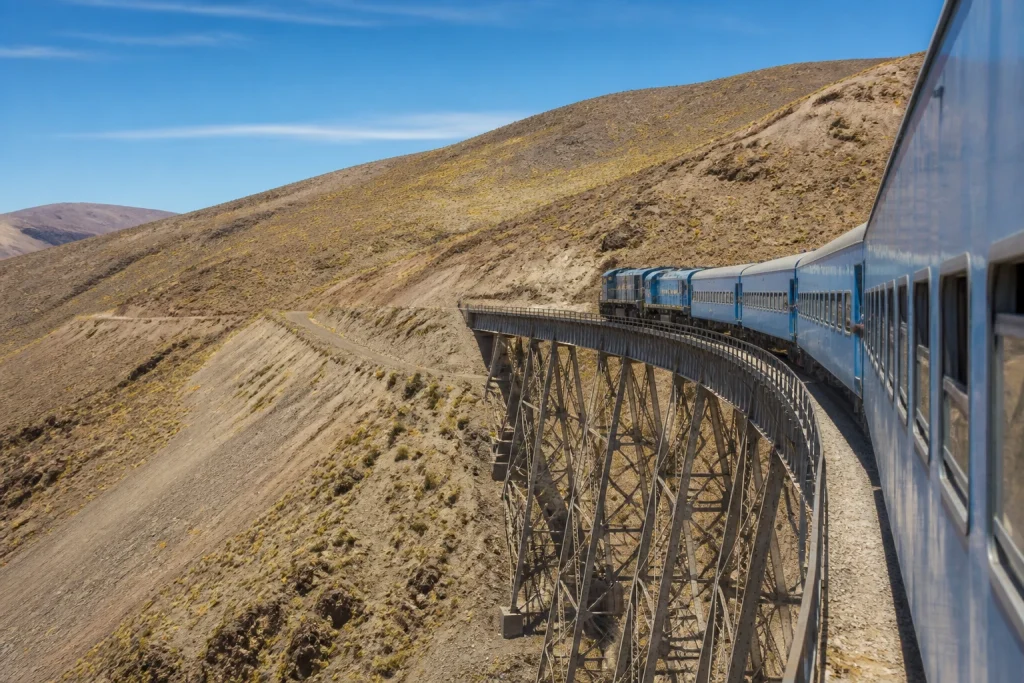 Train to the Clouds crossing the Polvorilla Viaduct in the high-altitude Puna of Salta