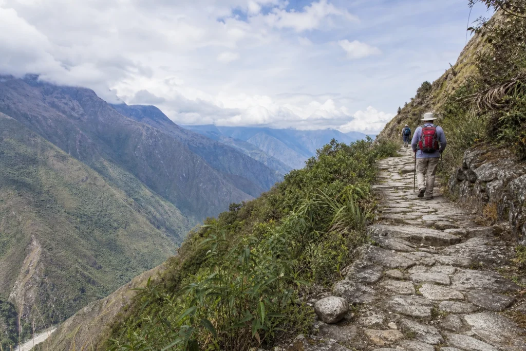Trekkers walking on the Inca Trail in Cusco, Peru