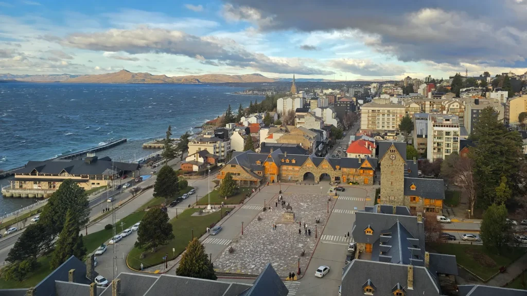 Nahuel Huapi lakefront and Bariloche city lights at blue hour