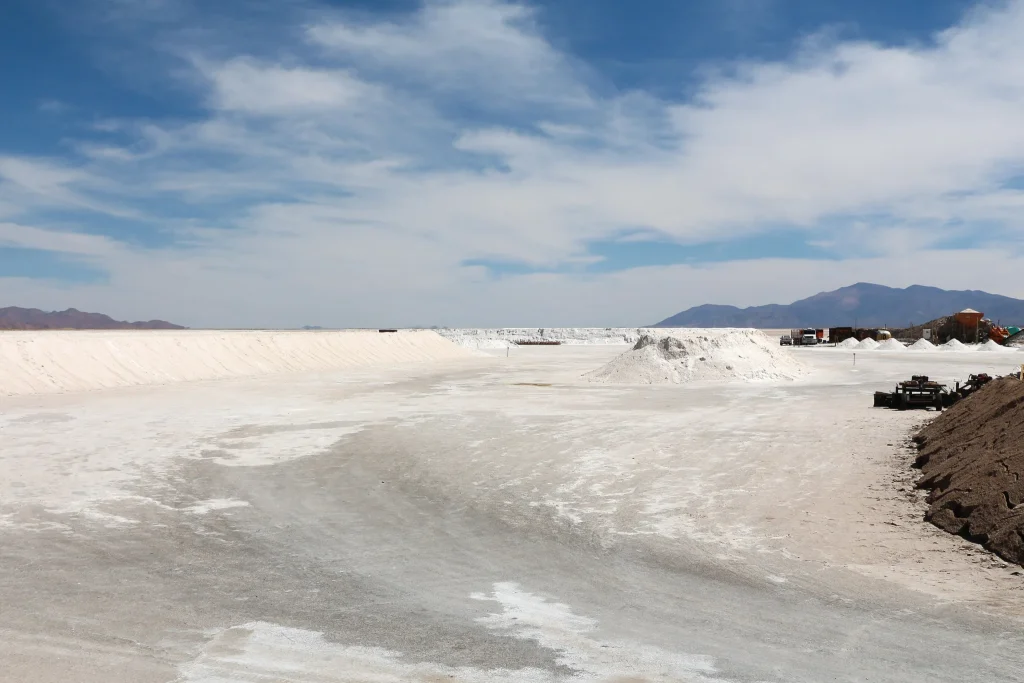 White salt flats and distant Andean mountains at Salinas Grandes in Jujuy, Argentina